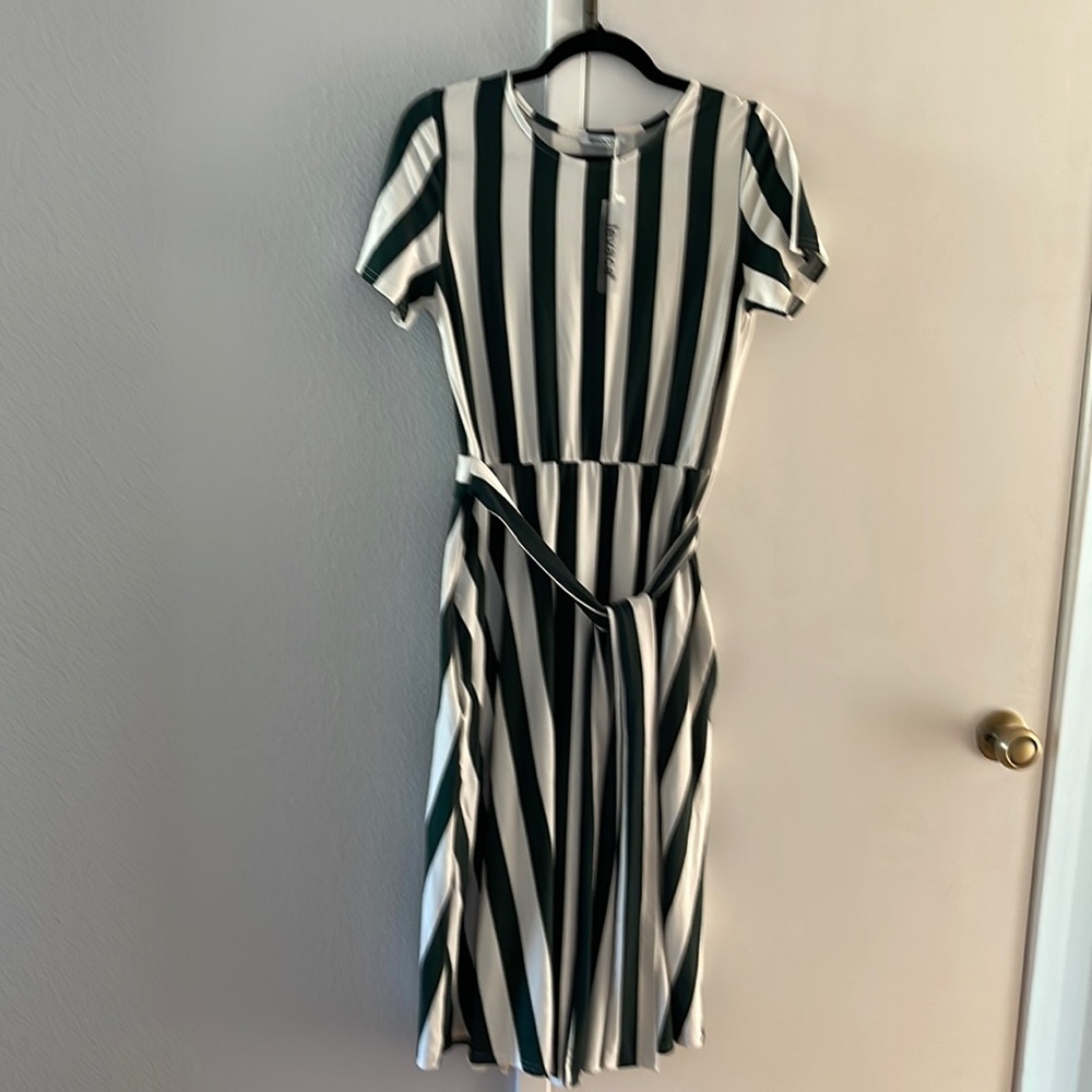 Green and White 97% polyester 3% spandex medi dress